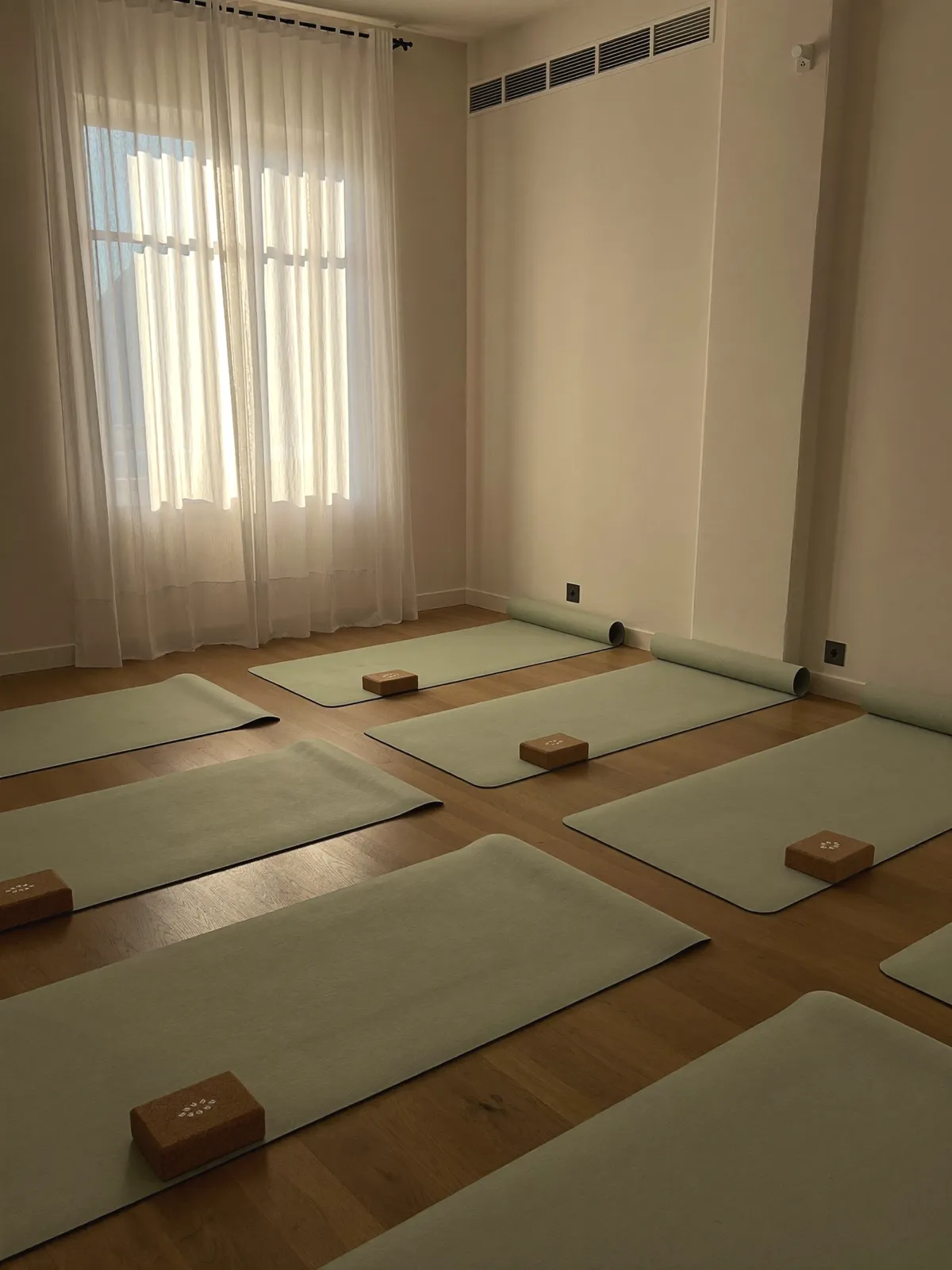 Mats and cork blocks laid out in the sage room